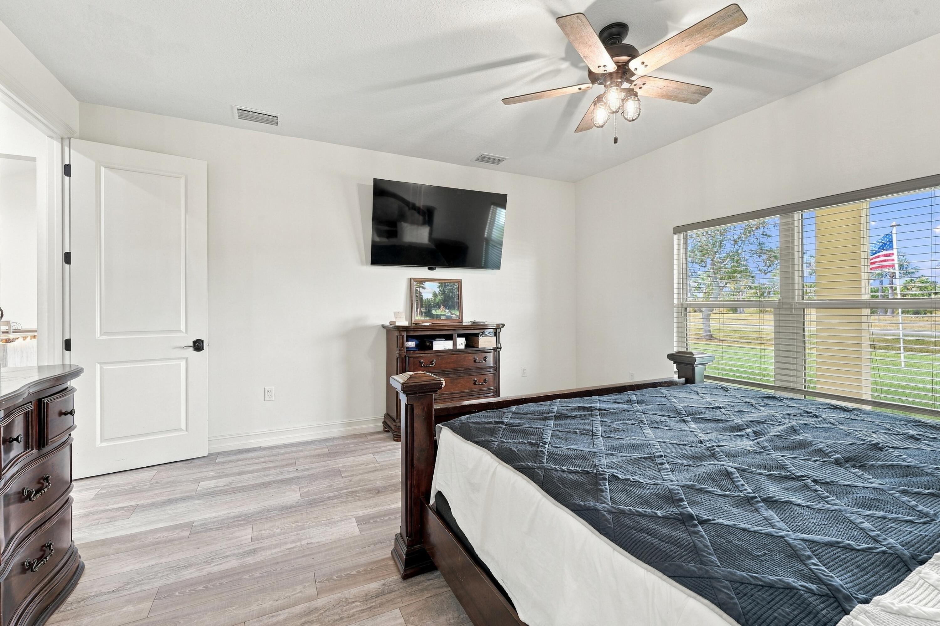Bright Bedroom with Backyard Views
