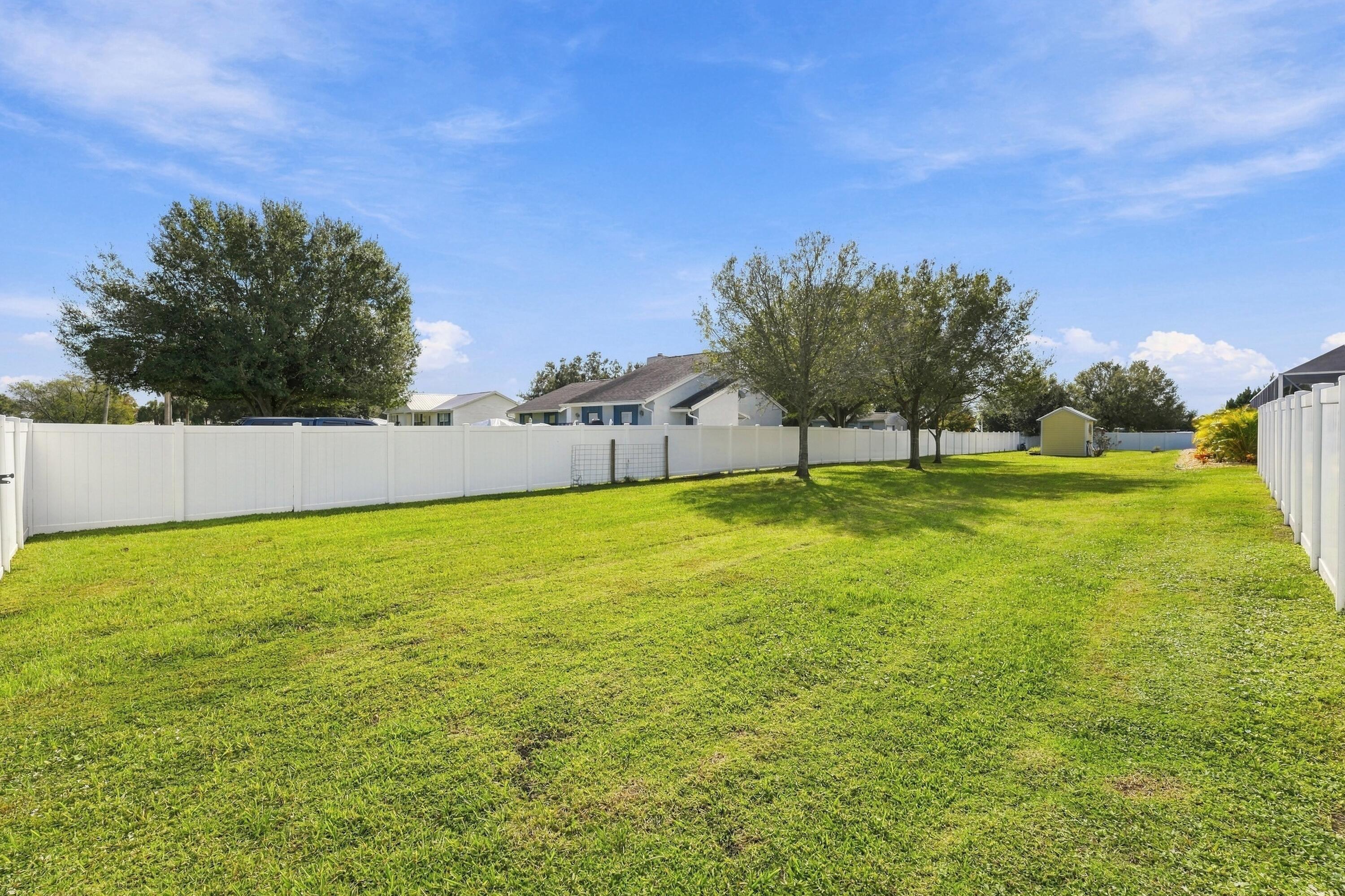 Large Fenced Yard with Mature Trees