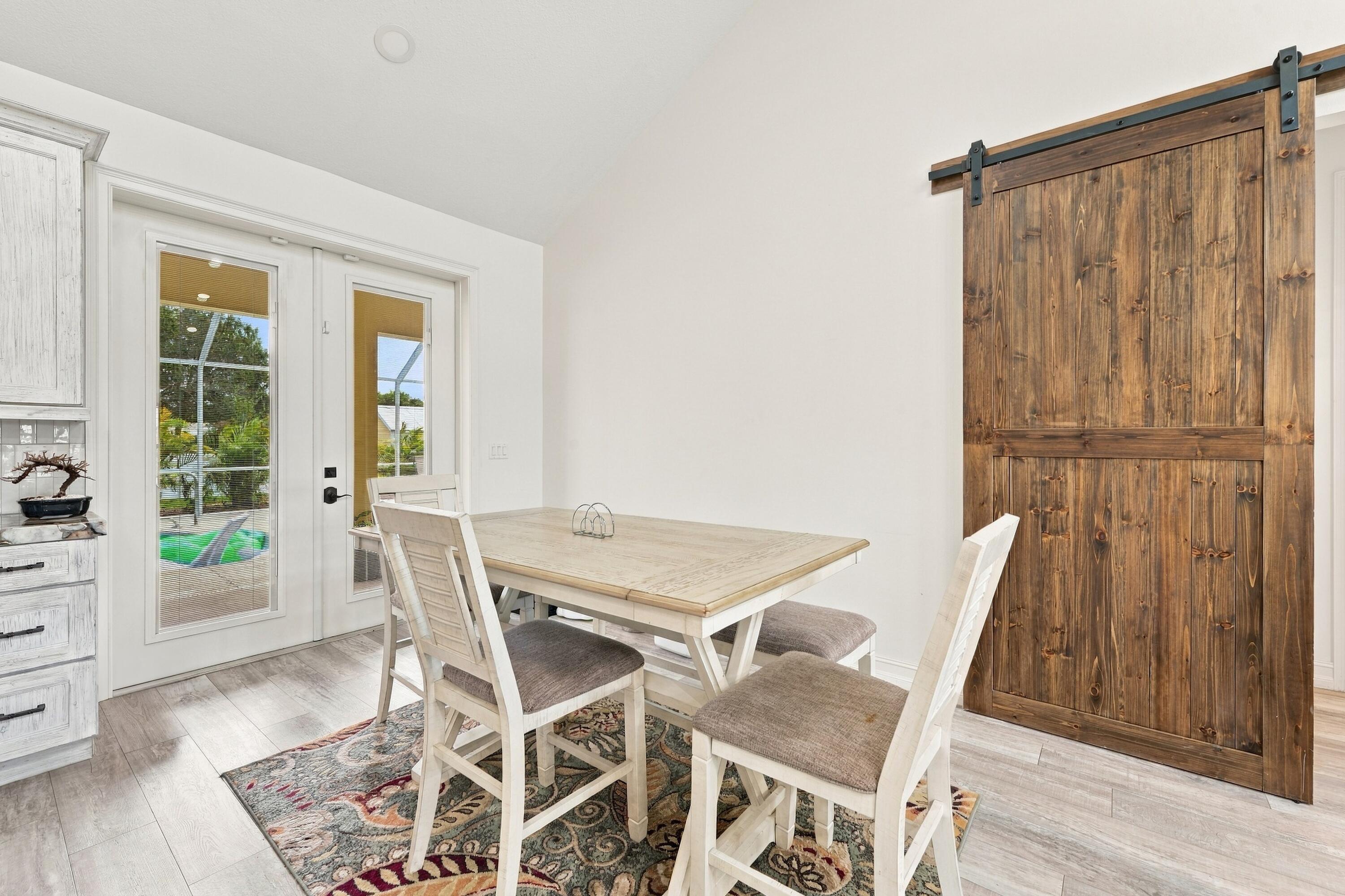 Dining Area with Rustic Barn Door