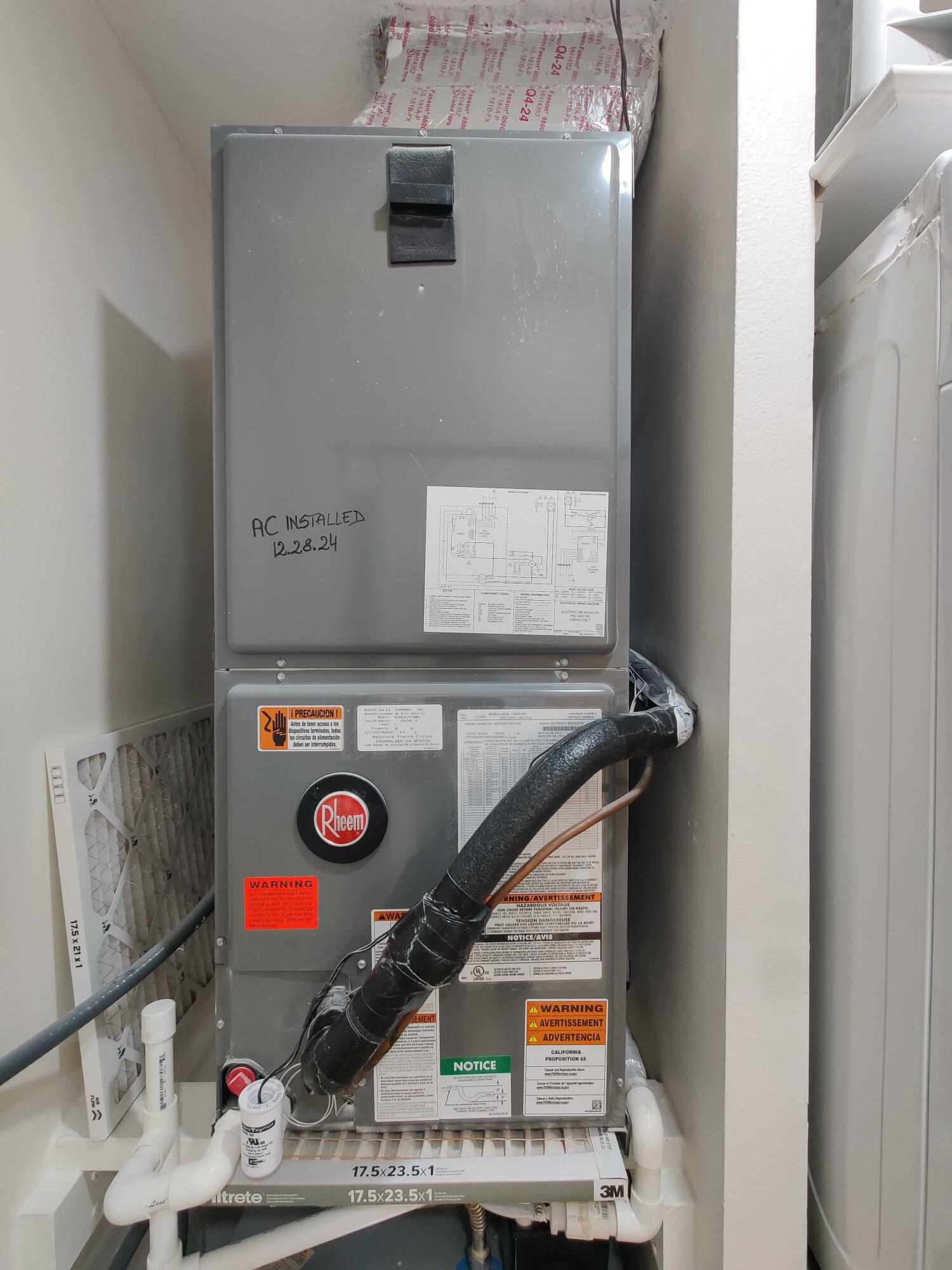 Upgraded central air conditioning unit with documented 2024 installation date