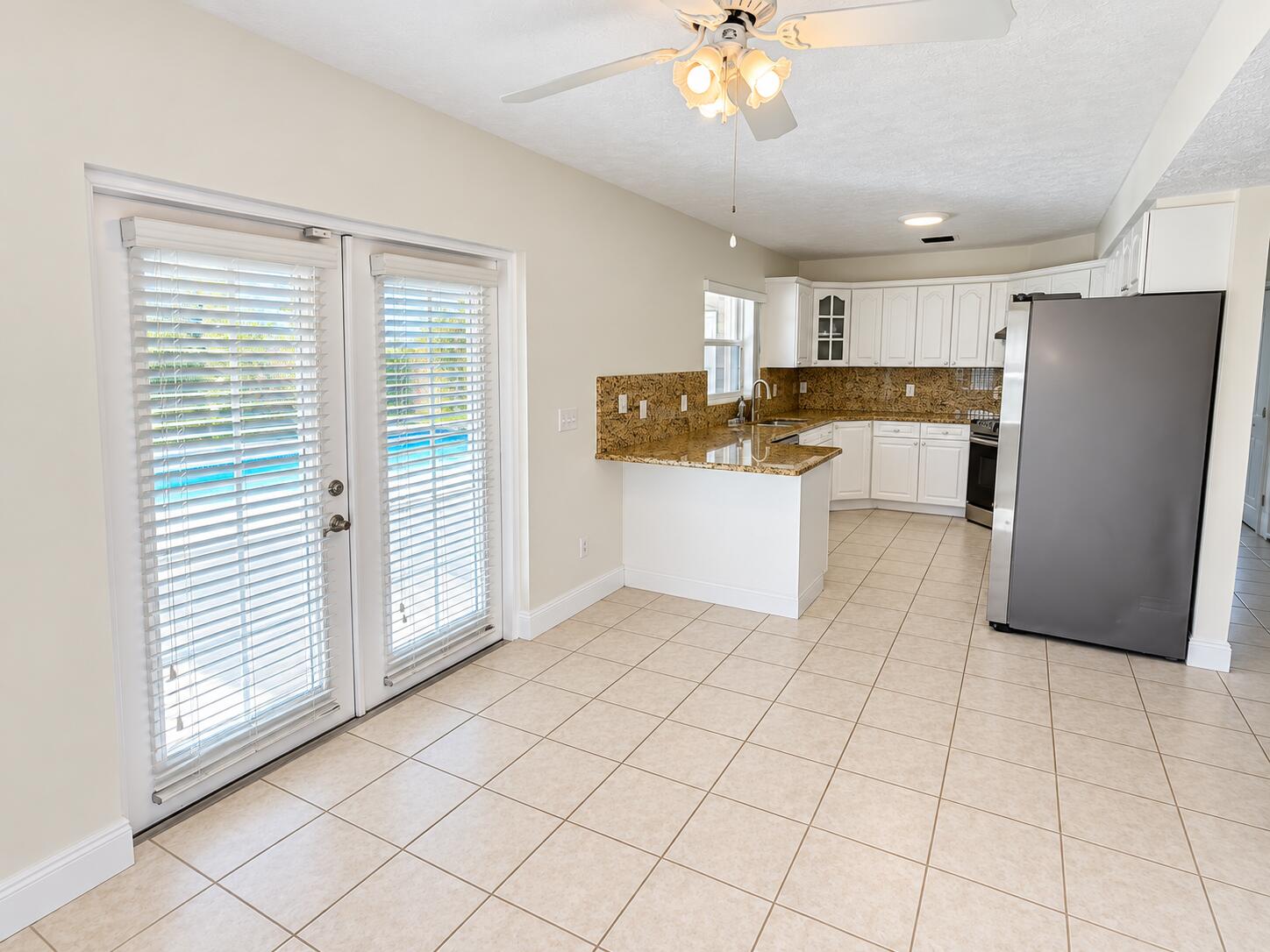 Bright Empty Kitchen and Dining Space