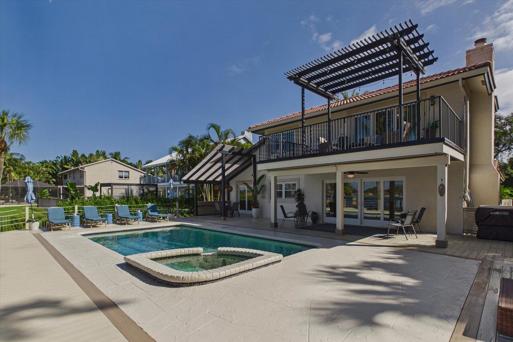 Rear view of Home with Pergolas and Balcony