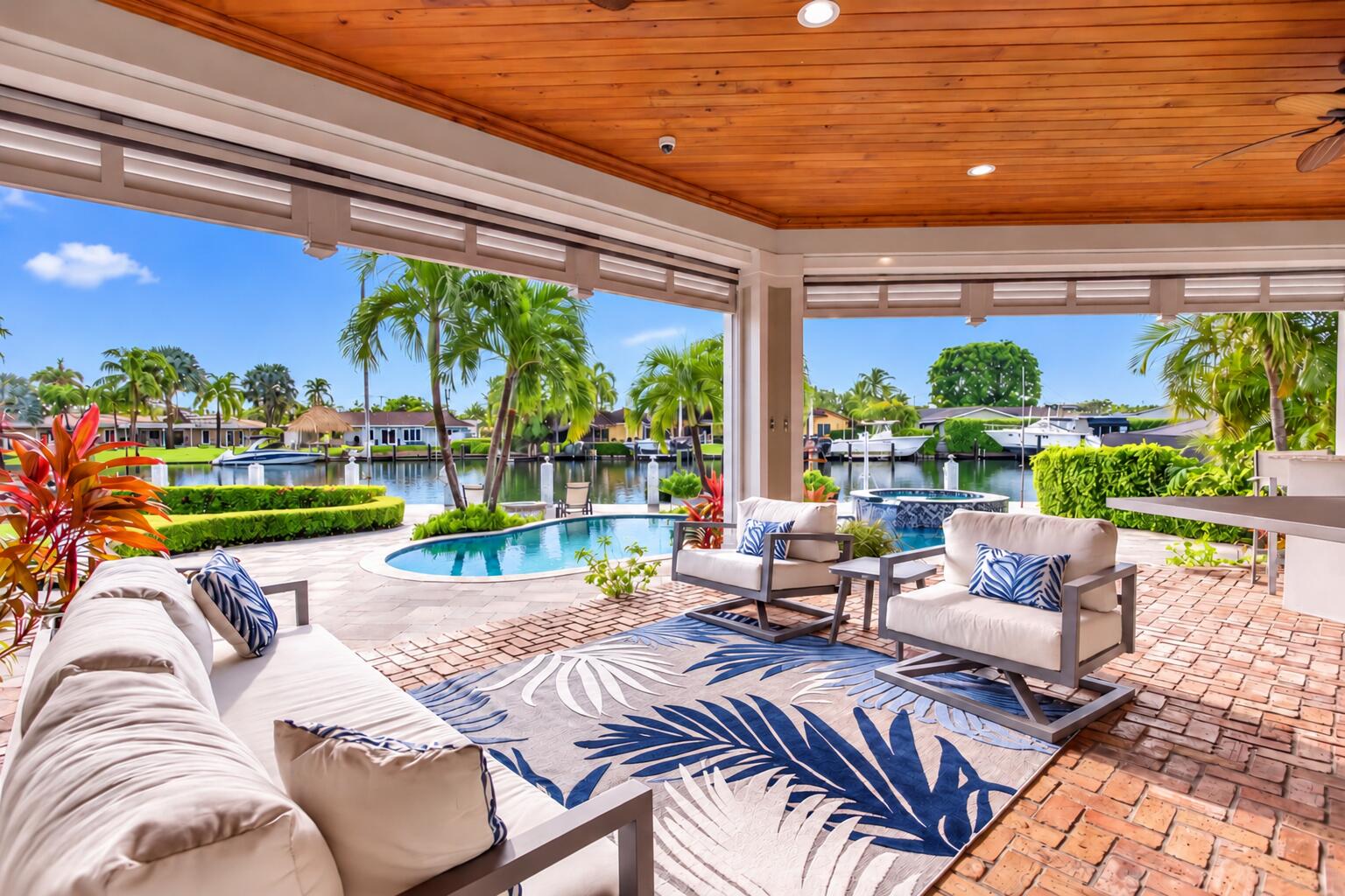 Covered porch has retractable screens for best of both worlds.