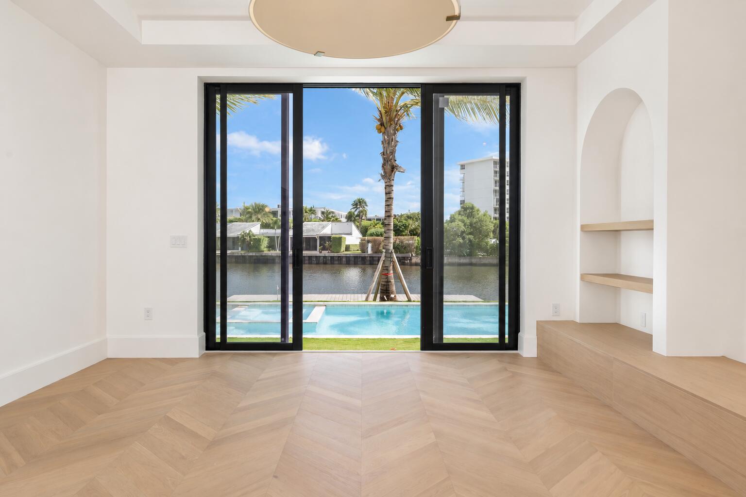 Minimalist Room with Sunny Waterfront Vi