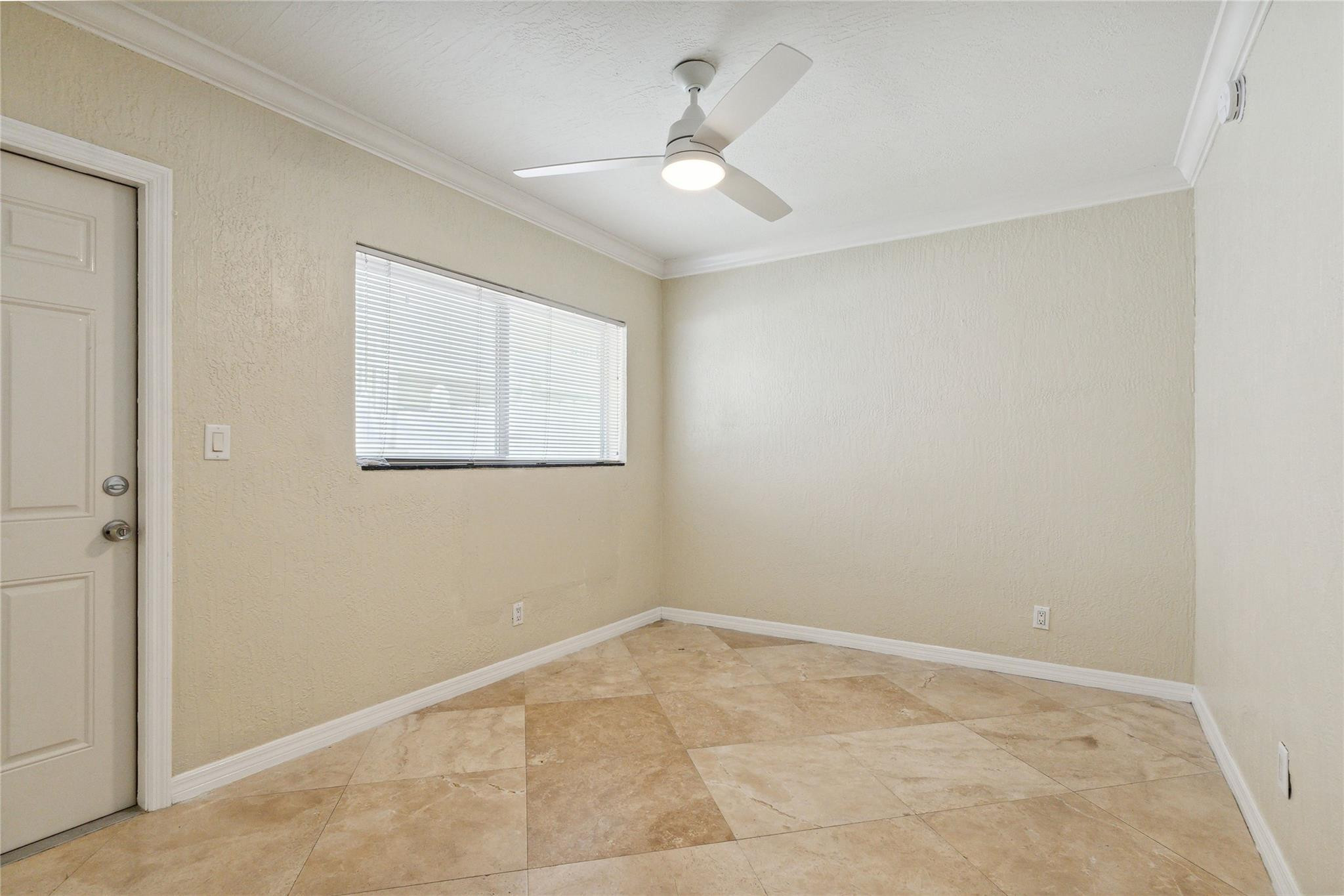 Bedroom marble floors large impact window
