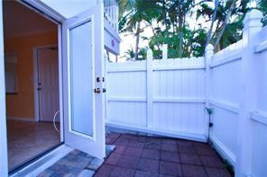 Private fenced paver patio