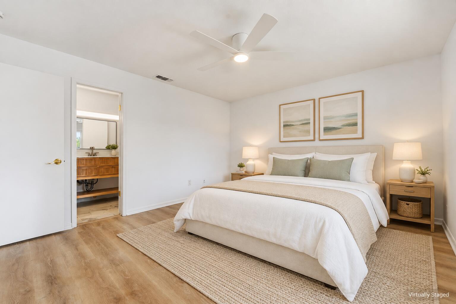 Refined coastal bedroom with open bathro
