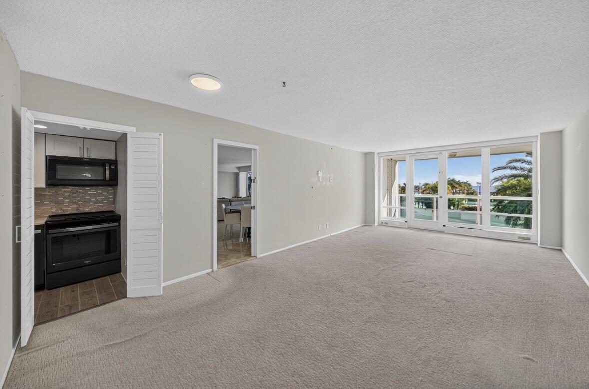 Secondary Residence - Living & Dining area including a pocket door for privacy from the Main Residence.