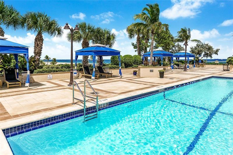 Heated Pool with Cabanas, BBQ and Shuffleboard!