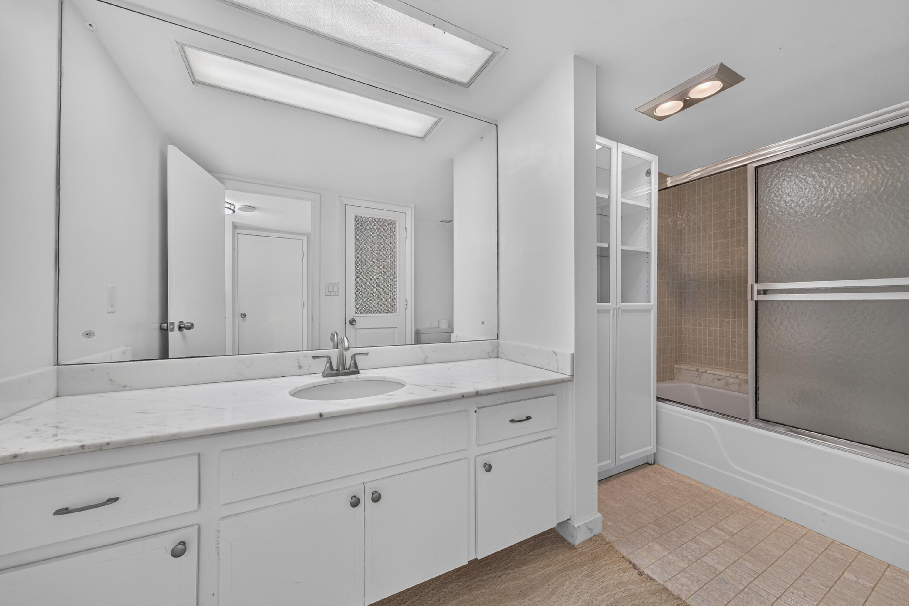 Secondary Residence - Primary Bathroom with bathtub.