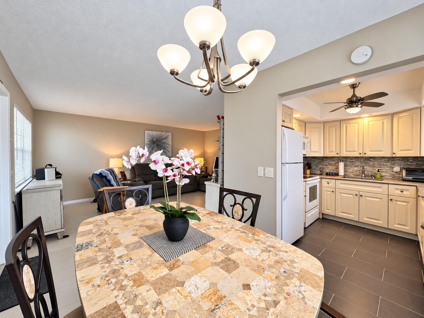 Elegant First Floor CORNER 2/2 With Pretty Updated Kitchen and Updates to Baths (Photos Have Been Color Corrected)