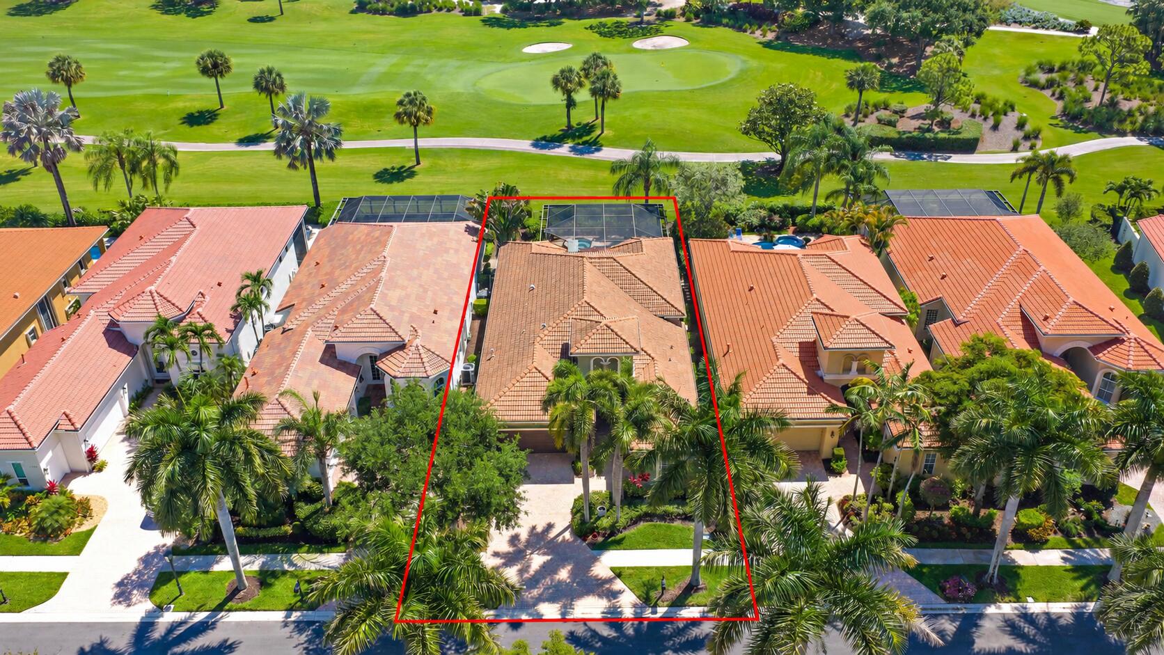 Restored tan-tile roof on center home