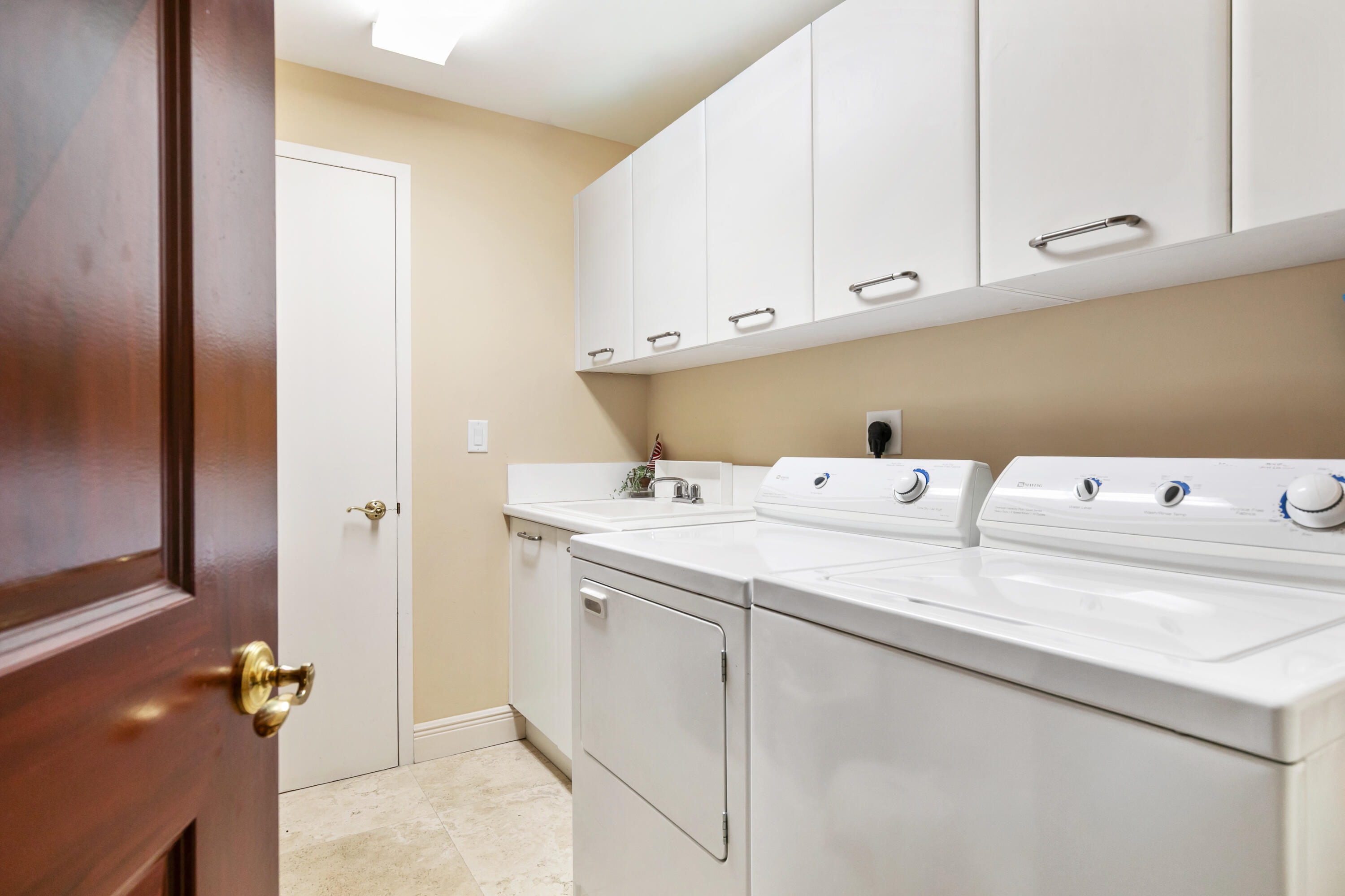 Residence 707 spacious laundry room.