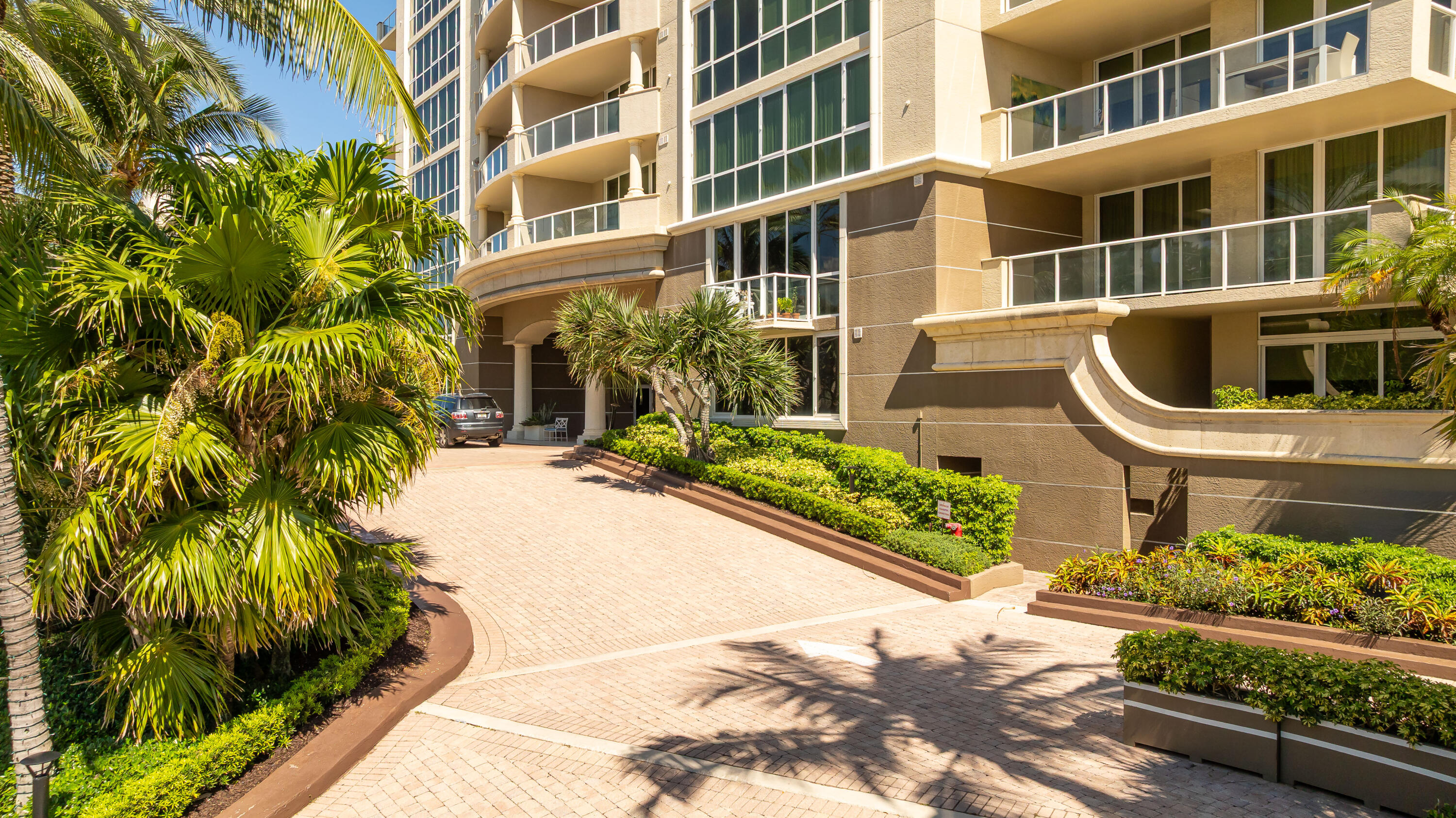 Entry drive into Oceane Grande. Valet parking available to residents.