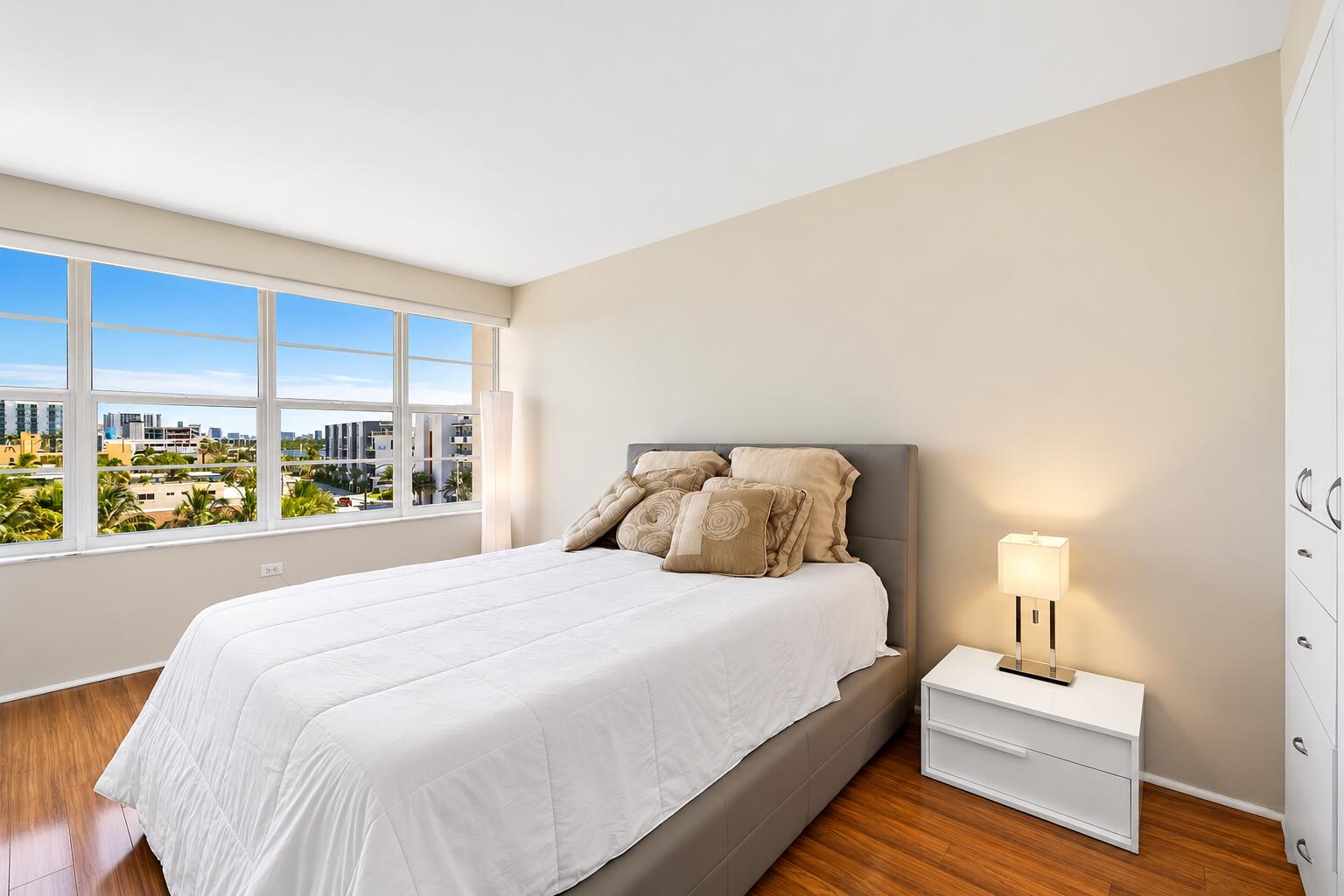 Bright Minimalist Bedroom with City View