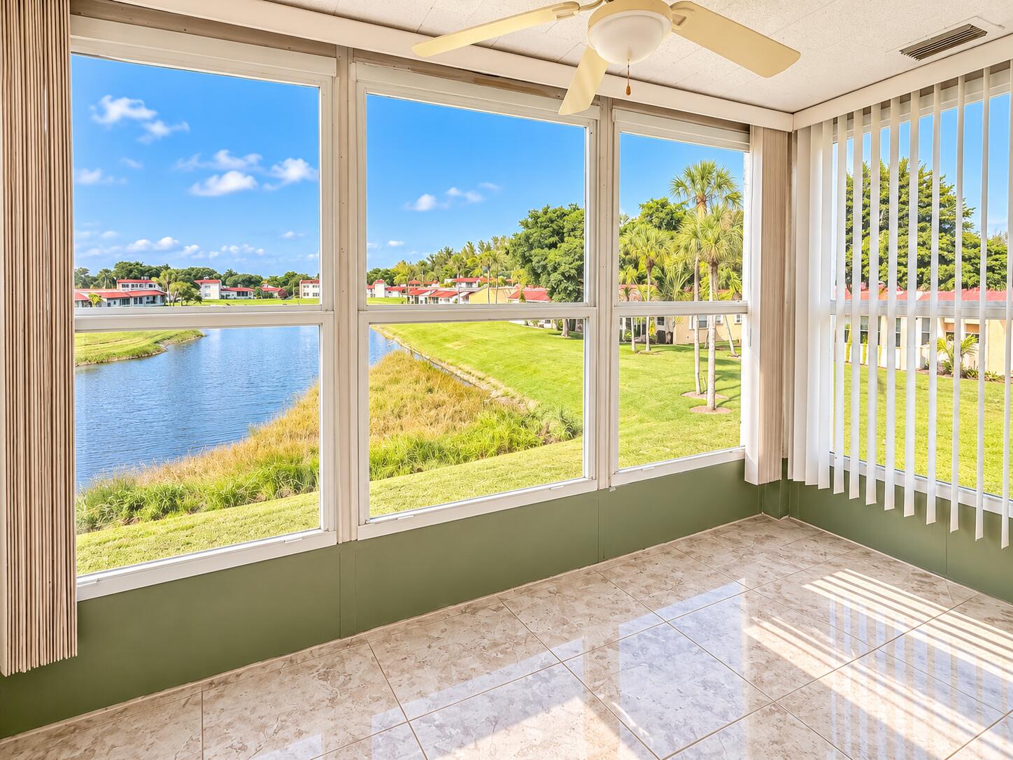 Bright Sunroom Overlooking the Pond Bright Sunroom Overlooking the Pond