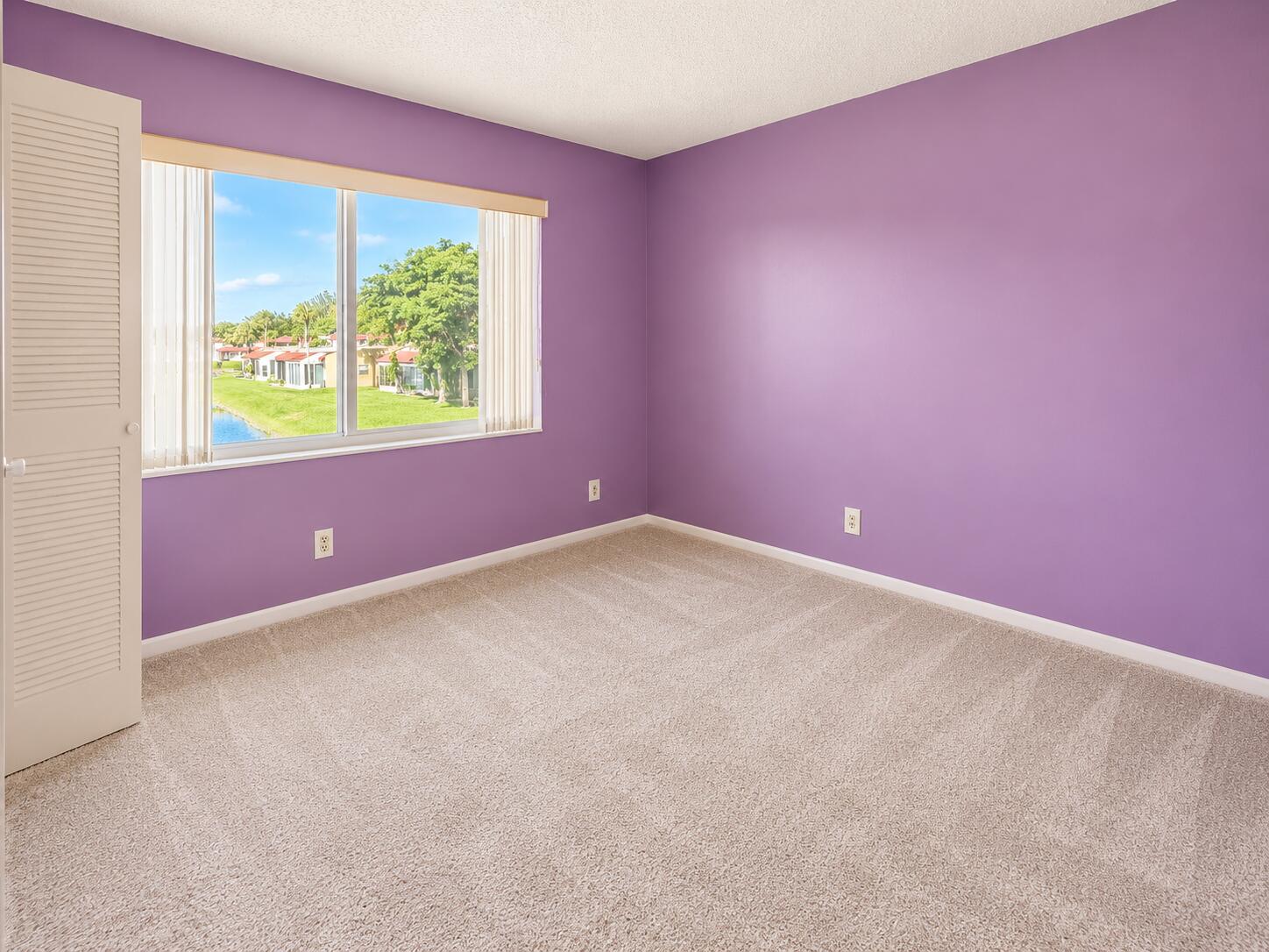 Bright Lavender Bedroom with Window View Bright Lavender Bedroom with Window View