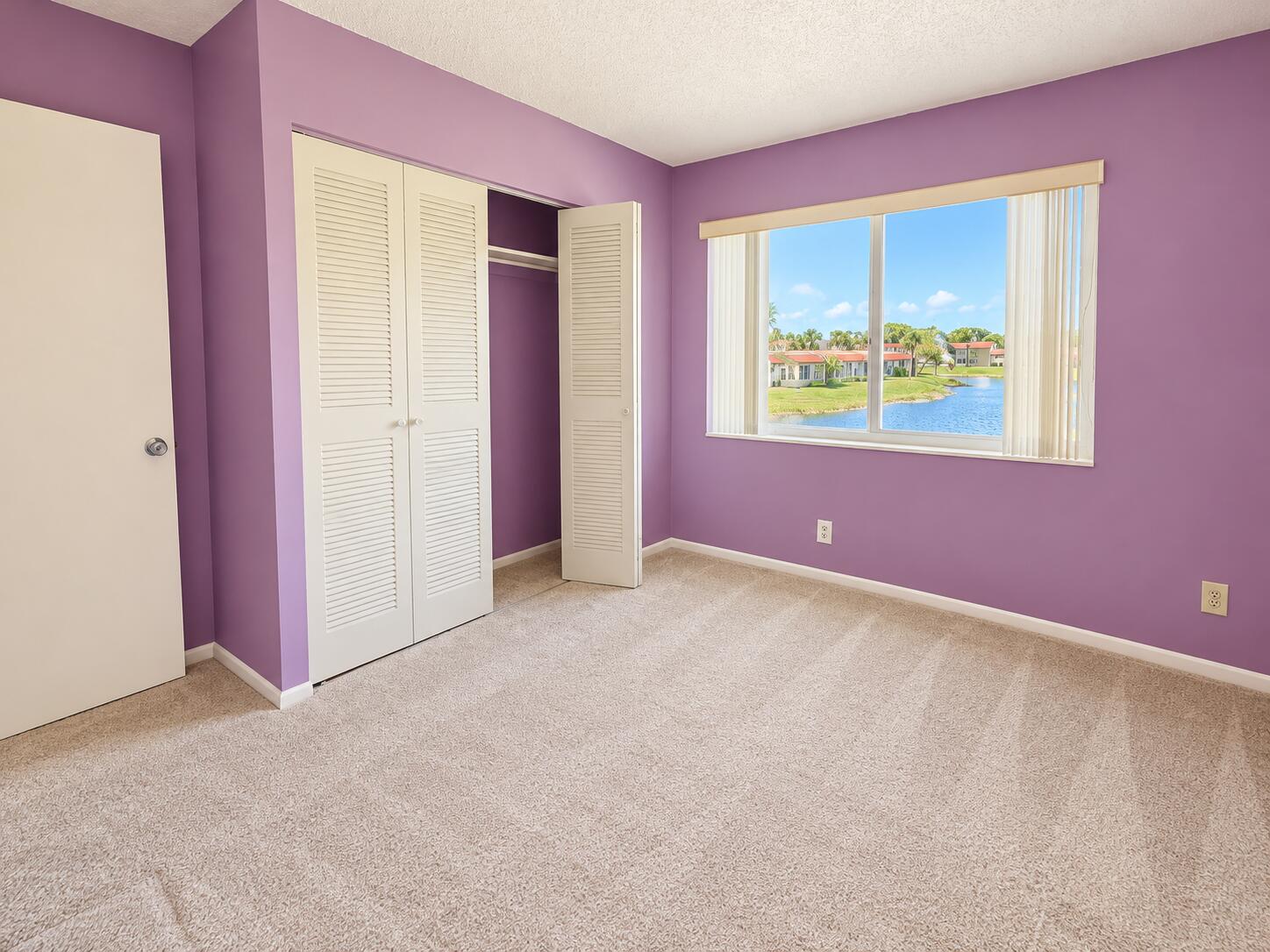 Bright Lavender Bedroom with Lake View Bright Lavender Bedroom with Lake View