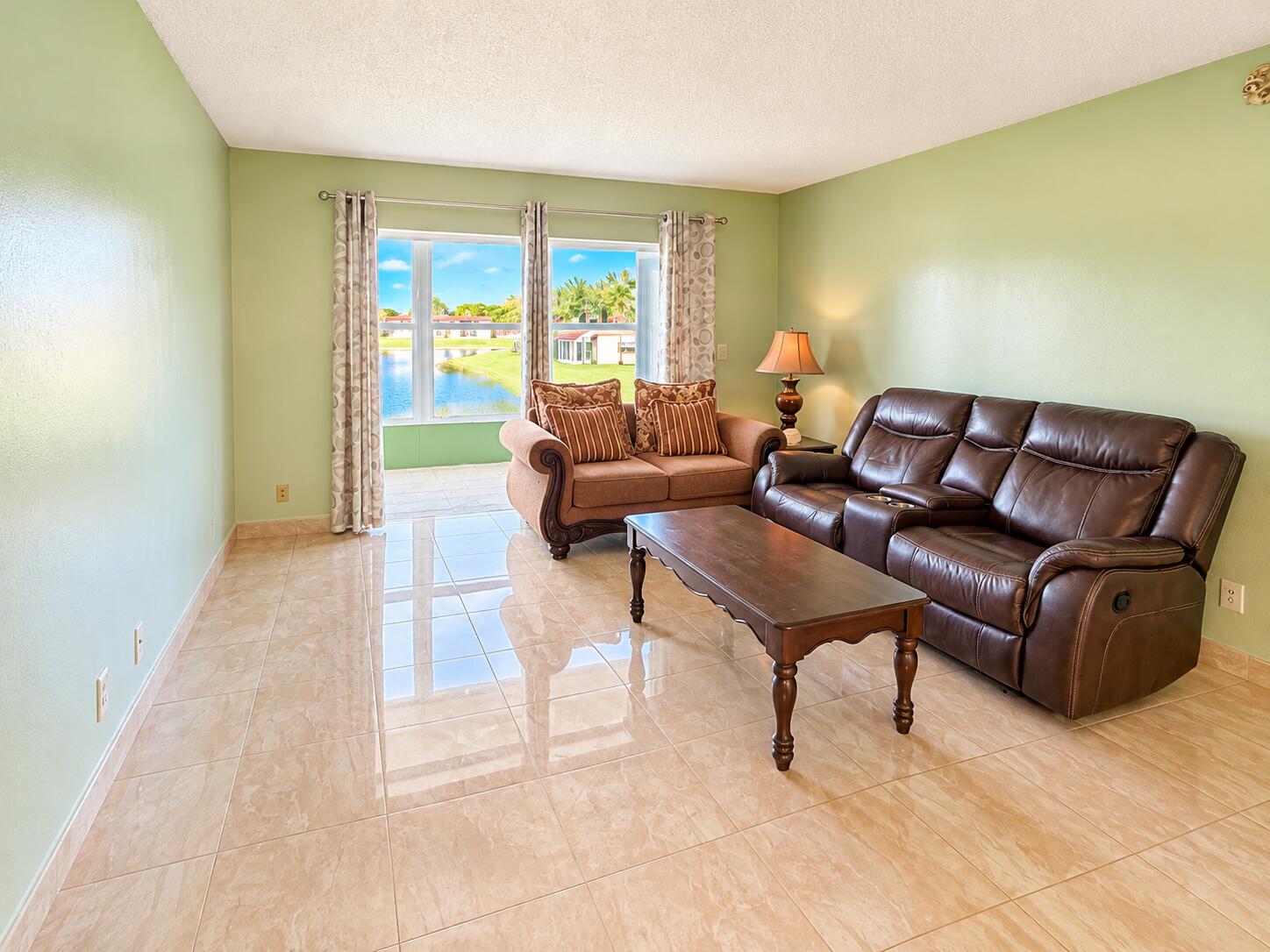 Bright Sage Living Room with Lake Views Bright Sage Living Room with Lake Views