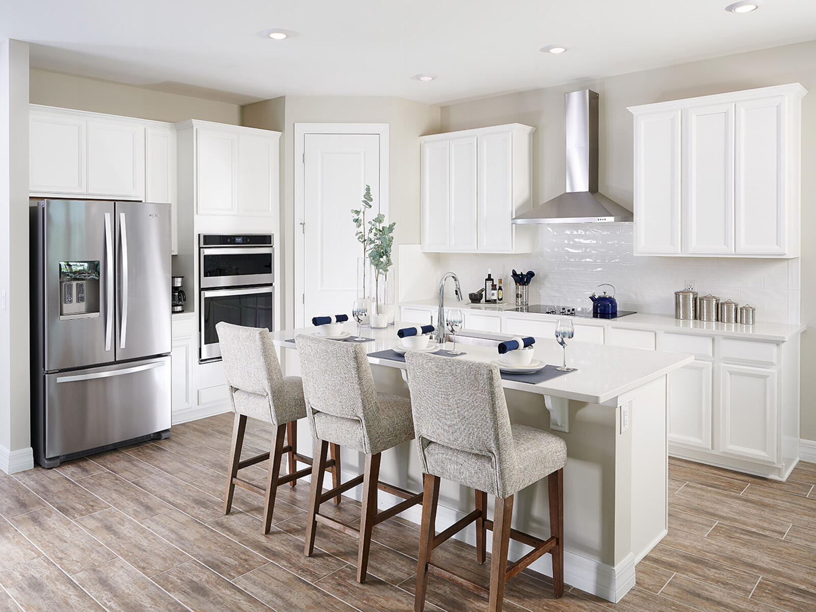 Photos are not of the actual home, but are photos of the builder home with same floorplan with similar interior finishes.