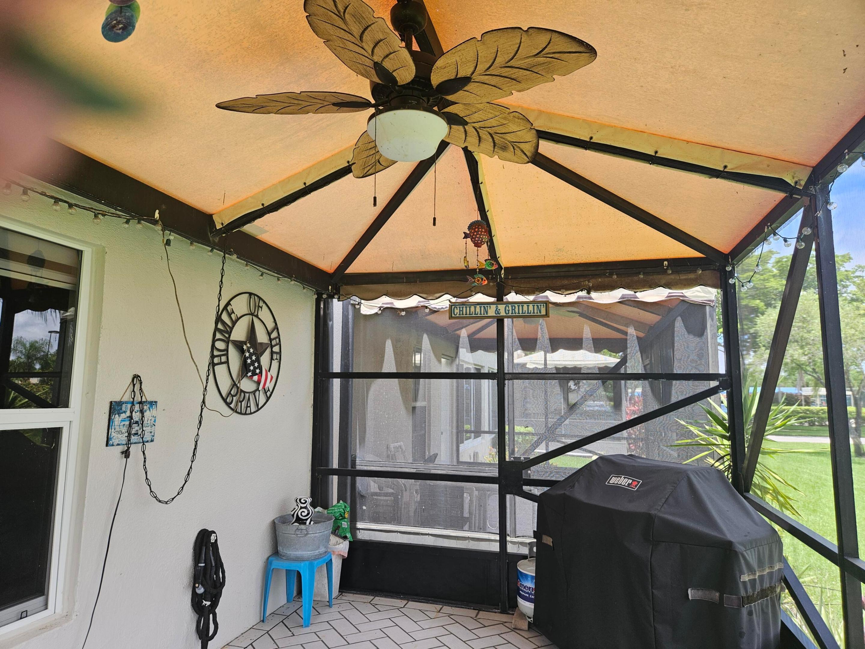inside covered patio with fan