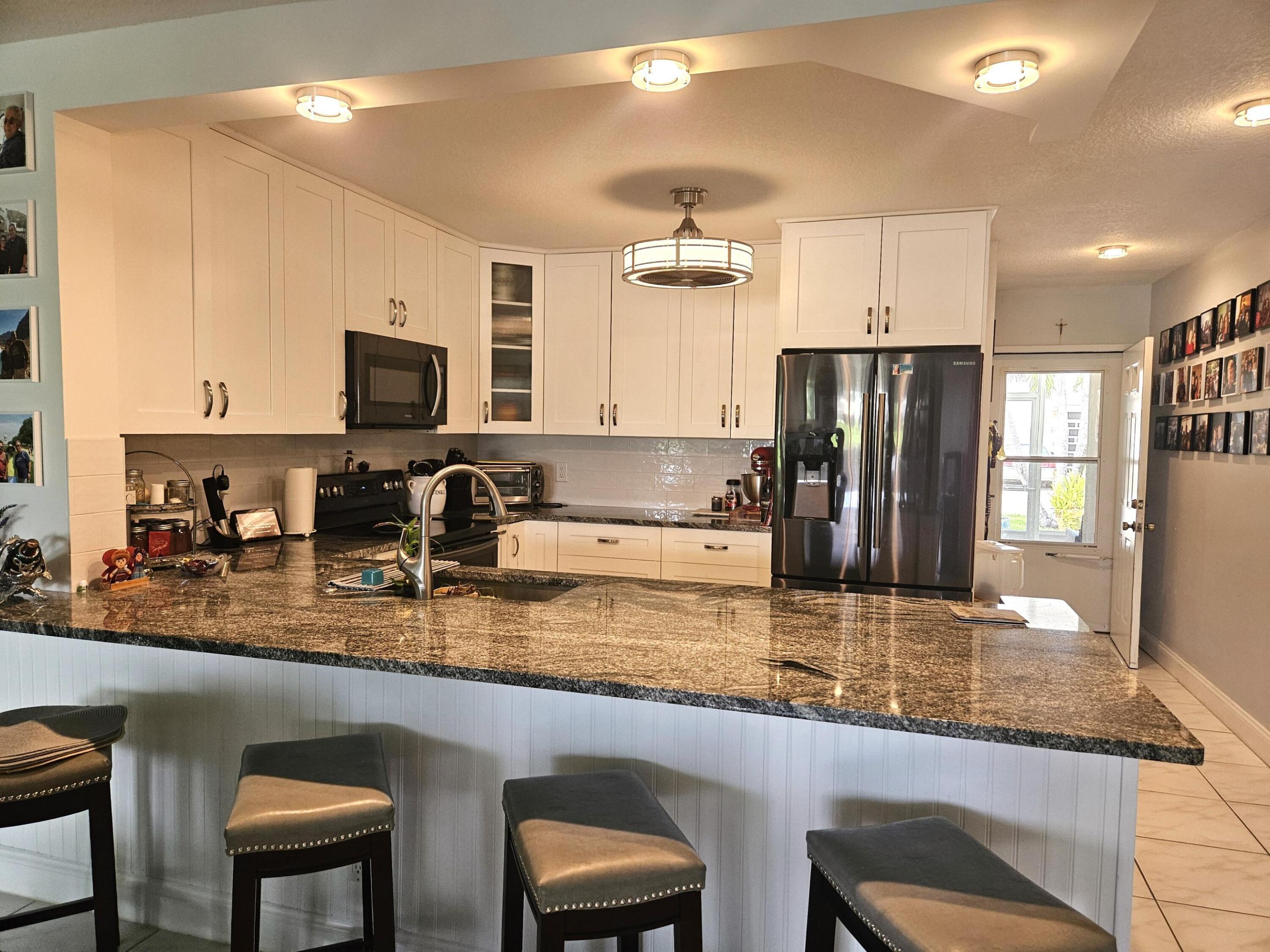 kitchen counter with stools