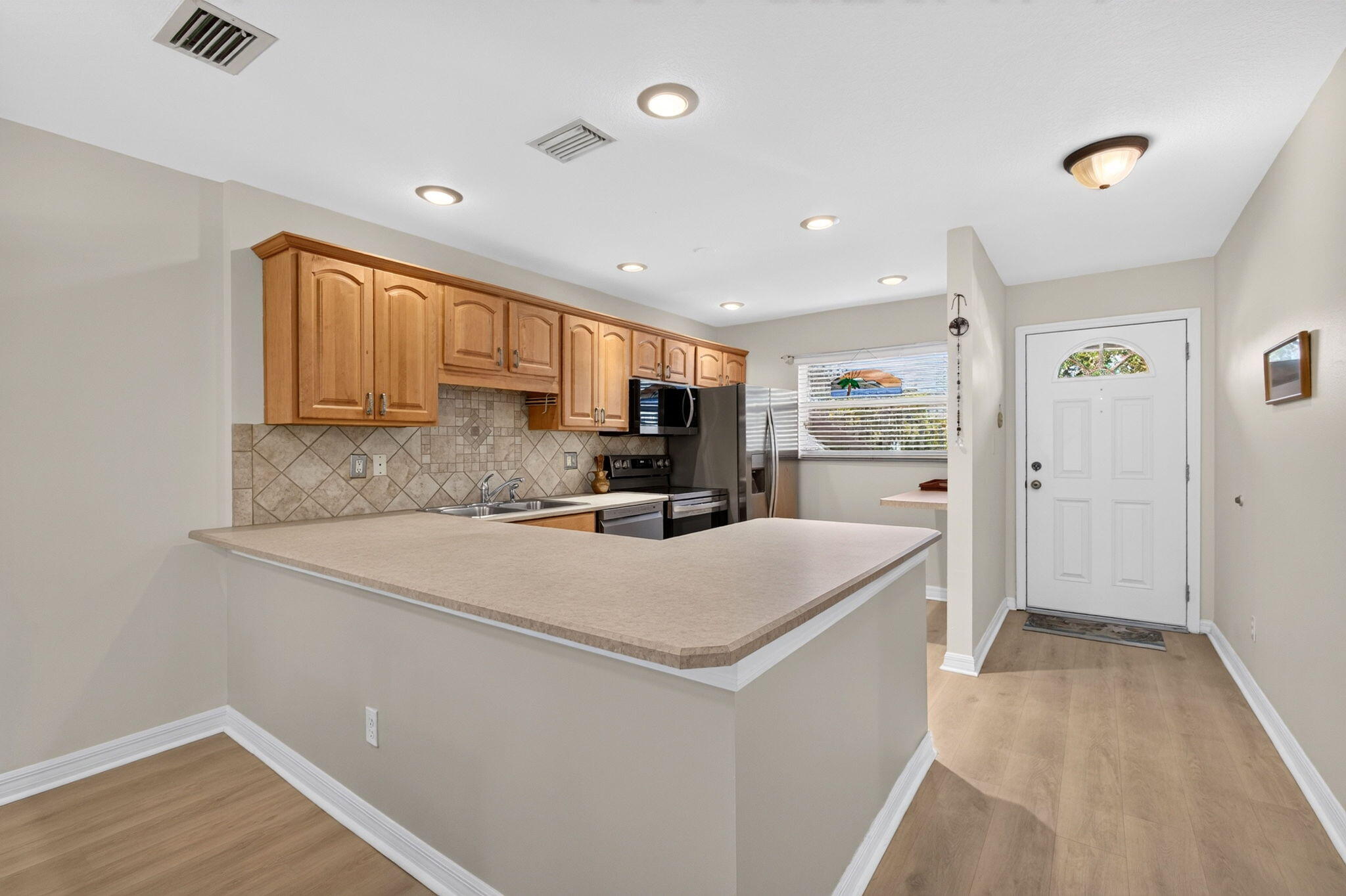 Open-concept kitchen keeps the conversation flowing