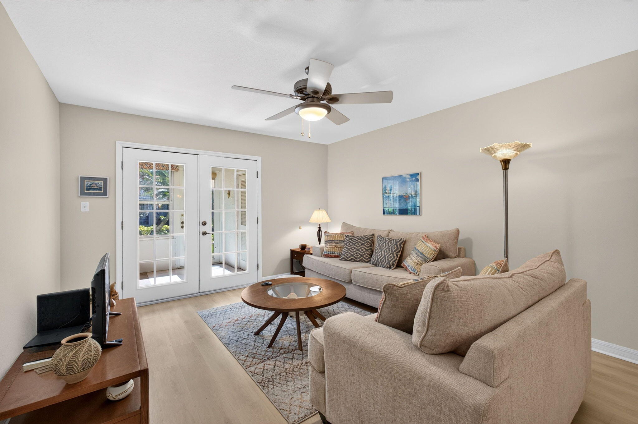 French doors extend the living space into the Florida room