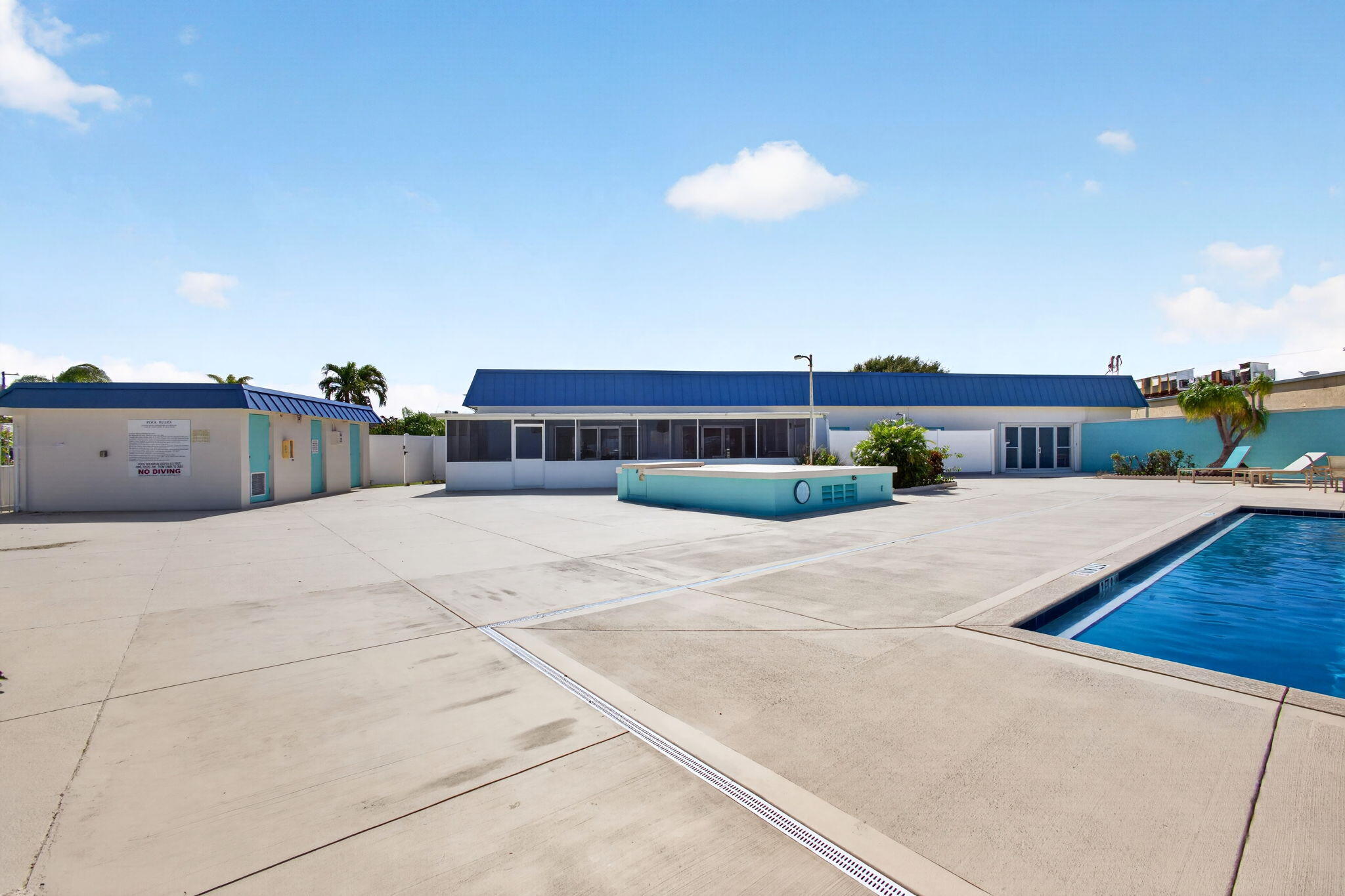 A pool deck made for long, lazy South Florida afternoons