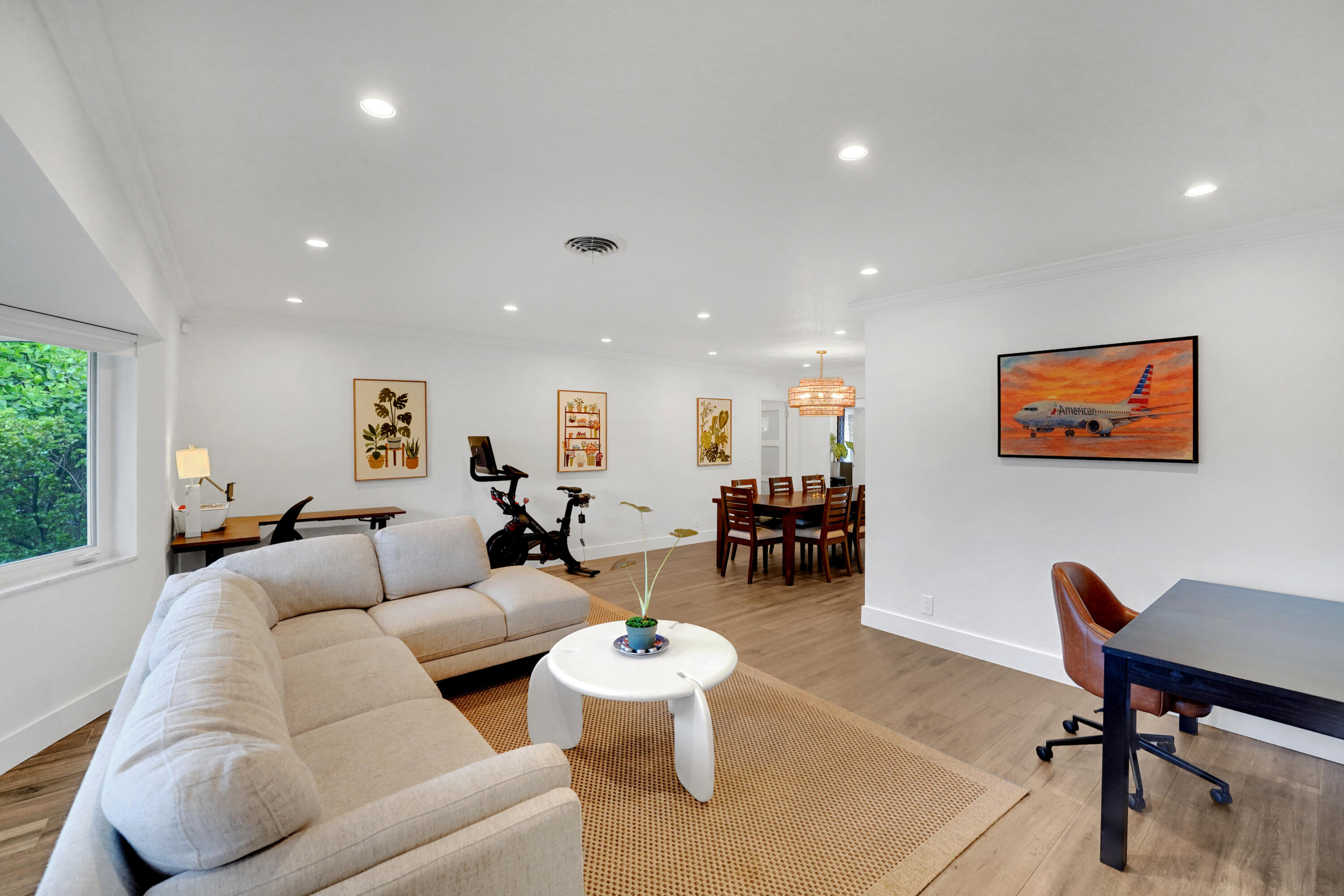Open floor plan interior featuring recessed lighting, and a multi-light drum chandelier