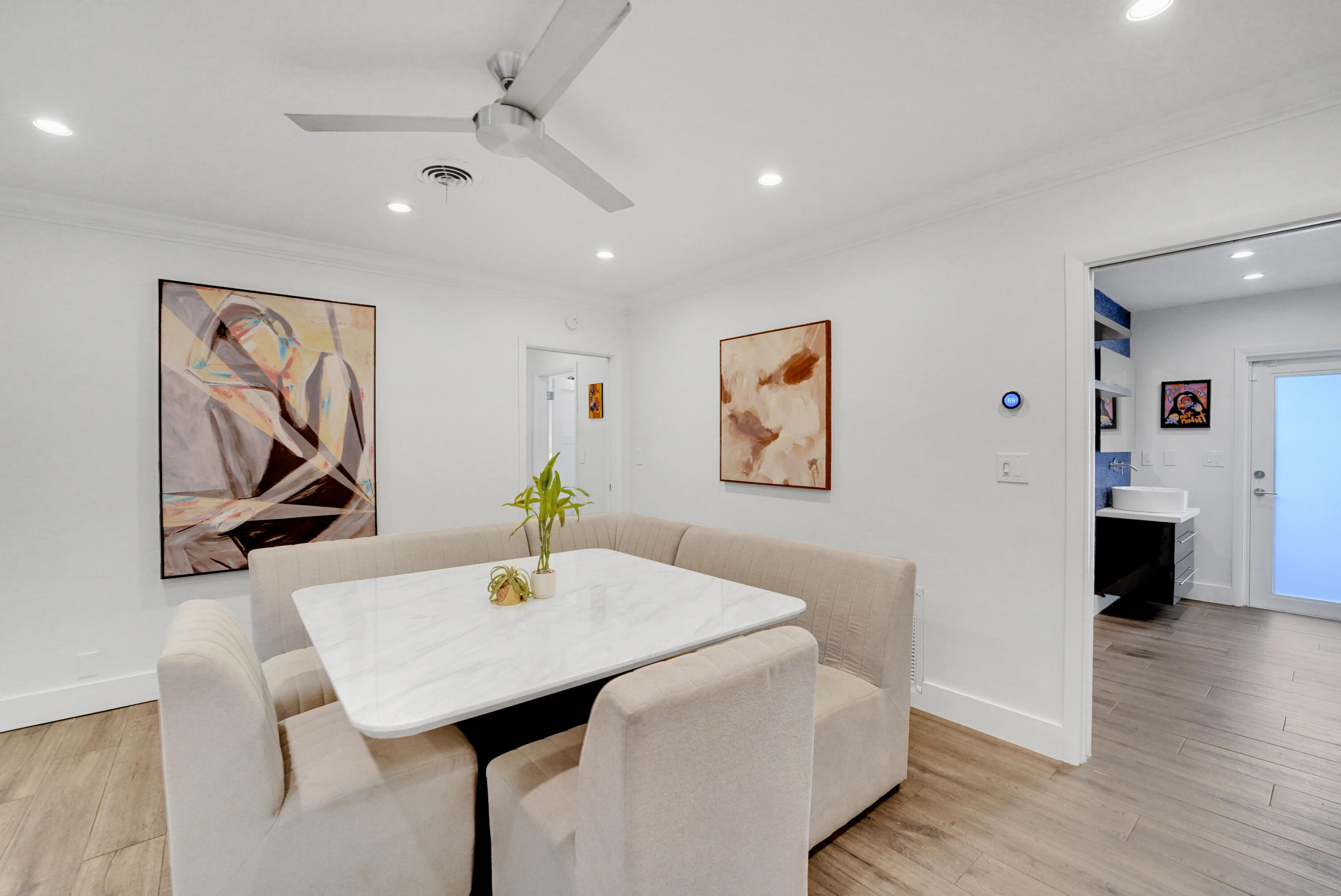 Recessed lighting, and a modern ceiling fan in breakfast room