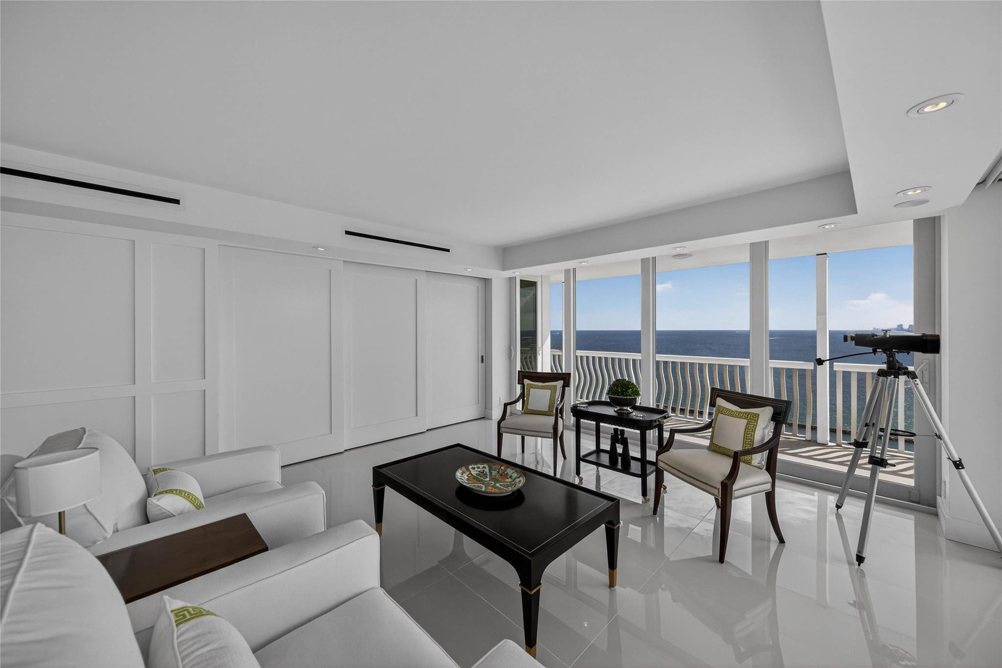 Living Room with Sliding Wall System To Den Closed