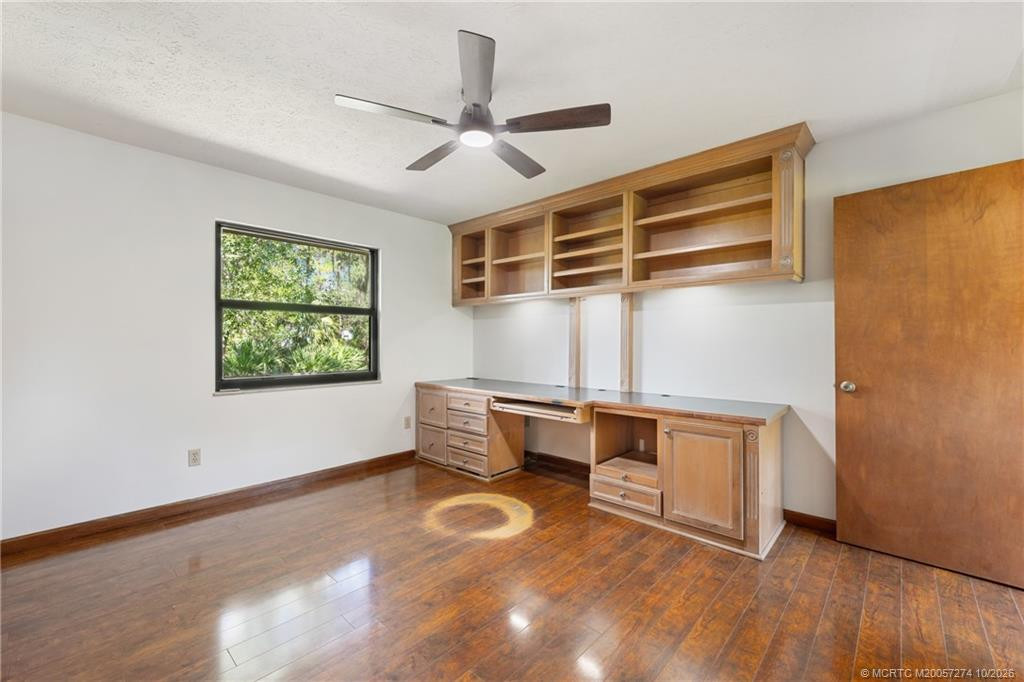 2nd bedroom with built in office and large wall closet.