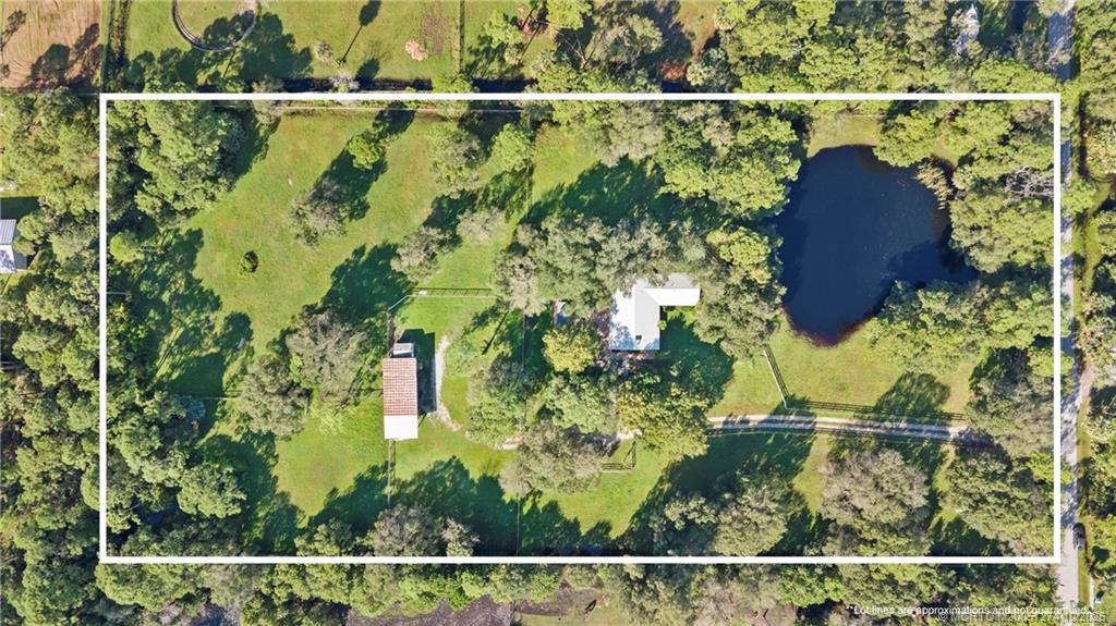 5 newly fenced acres with 3/2 and 3 stall barn. 5 newly fenced acres with 3/2 and 3 stall barn.