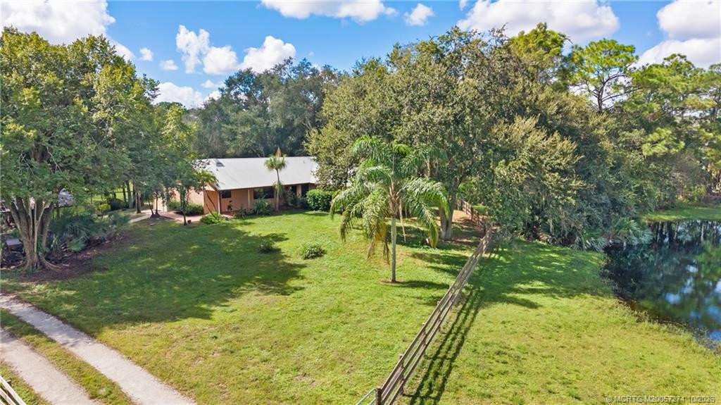 Home surrounded by beautiful mature trees.