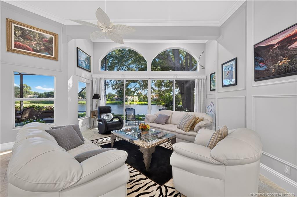 Expanded Living Room with golf & water views.