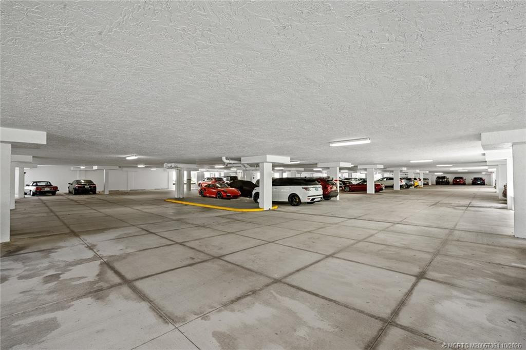 Convenient covered parking beneath the building, providing protection from the elements and easy access to the residences.