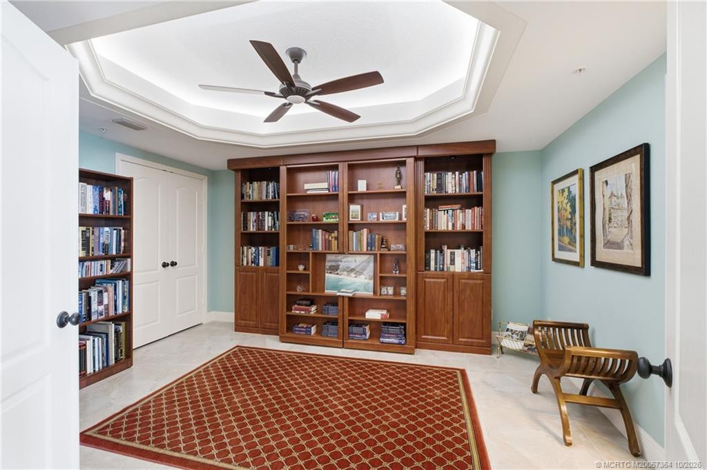 Beautifully appointed library featuring a Murphy bed that easily transforms this inviting space into additional guest accommodations.
