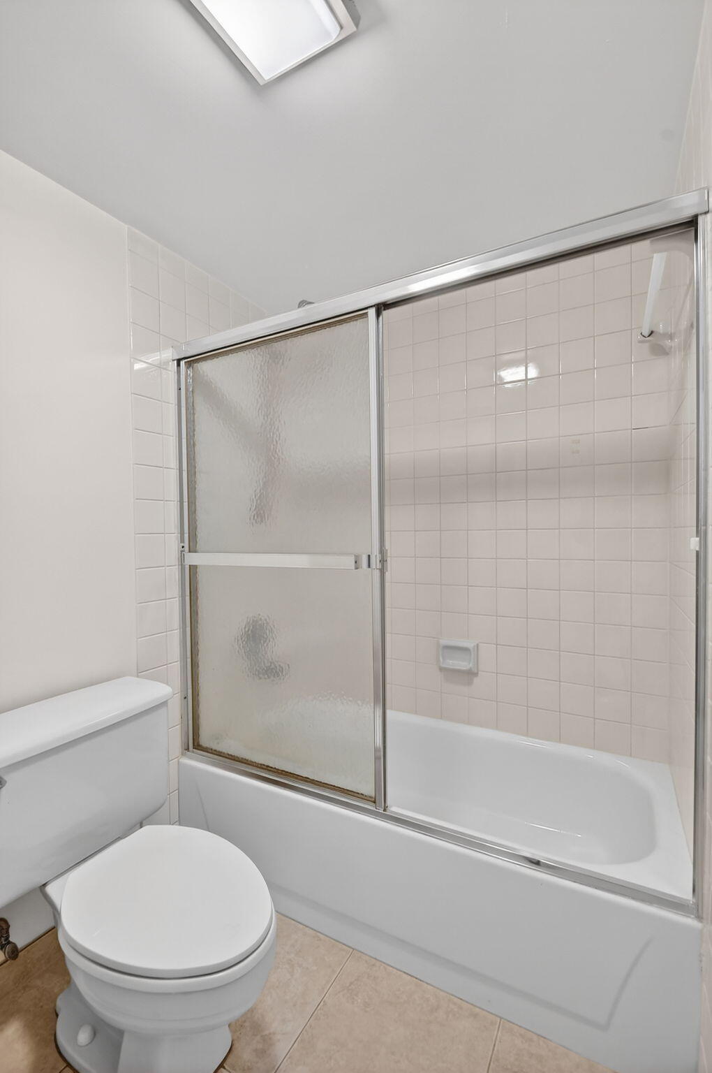 Second full bathroom has shower/tub combo